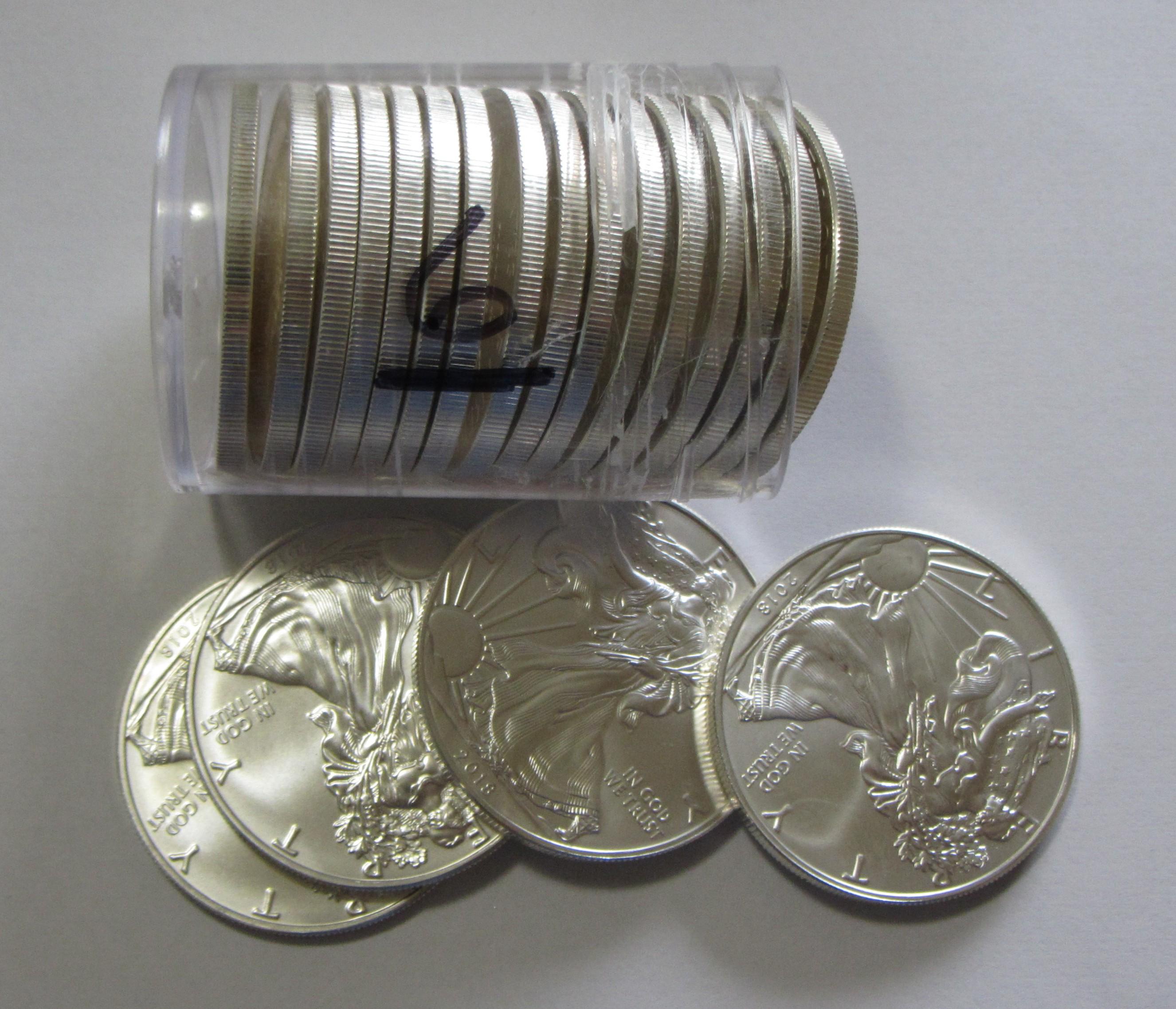 ROLL OF 20 MIXED DATE $1 SILVER EAGLES SOME MAY HAVE LIGHT TONING