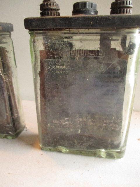 4 Gould Glass Batteries and 3 Empty Glass Battery Cases