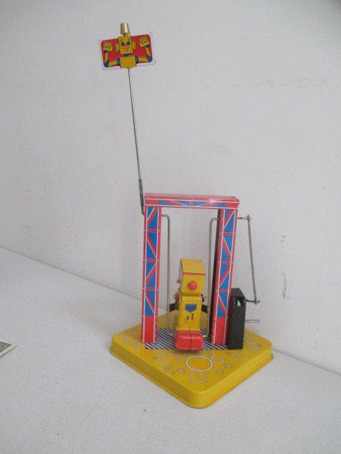 Tin Robot on Swing, 1974 Ban & Hrico Robot Metal Bank and Ideal See-Through Train Engine