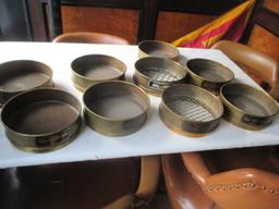 8 antique brass sifters and pan