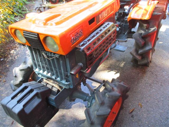 Kubota B 7000 4 Wheel Drive, 2 Cylinder Diesel Tractor with Roto Tiller Attachment