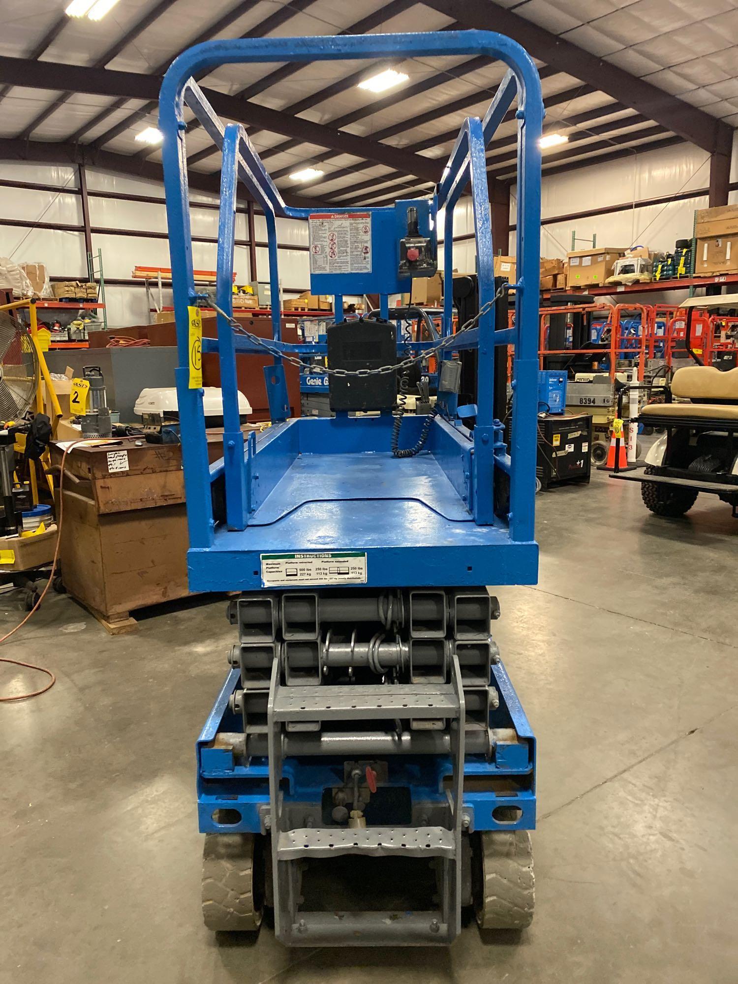 GENIE GS1930 SCISSOR LIFT, SELF PROPELLED, 19' PLATFORM HEIGHT, BUILT IN BATTERY CHARGER, SLIDE OUT