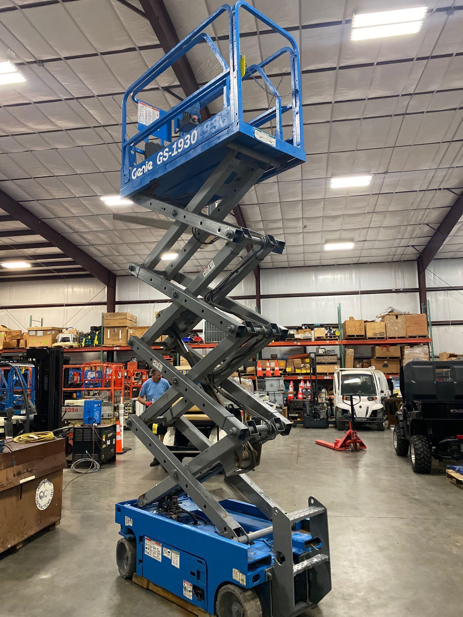 GENIE GS1930 SCISSOR LIFT, SELF PROPELLED, 19' PLATFORM HEIGHT, BUILT IN BATTERY CHARGER, SLIDE OUT