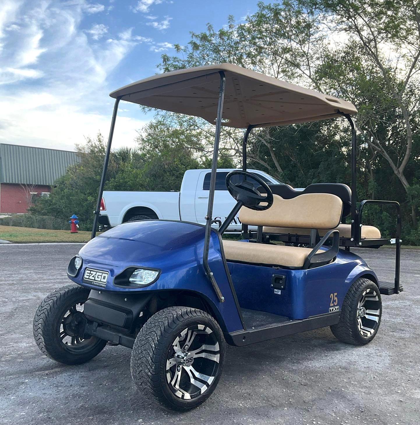 2019 EZ-GO TXT GOLF CART , CUSTOM RIMS, LIFT KIT, BACK SEAT FOLD DOWN TO FLAT BED, 36V BATTERY CH...