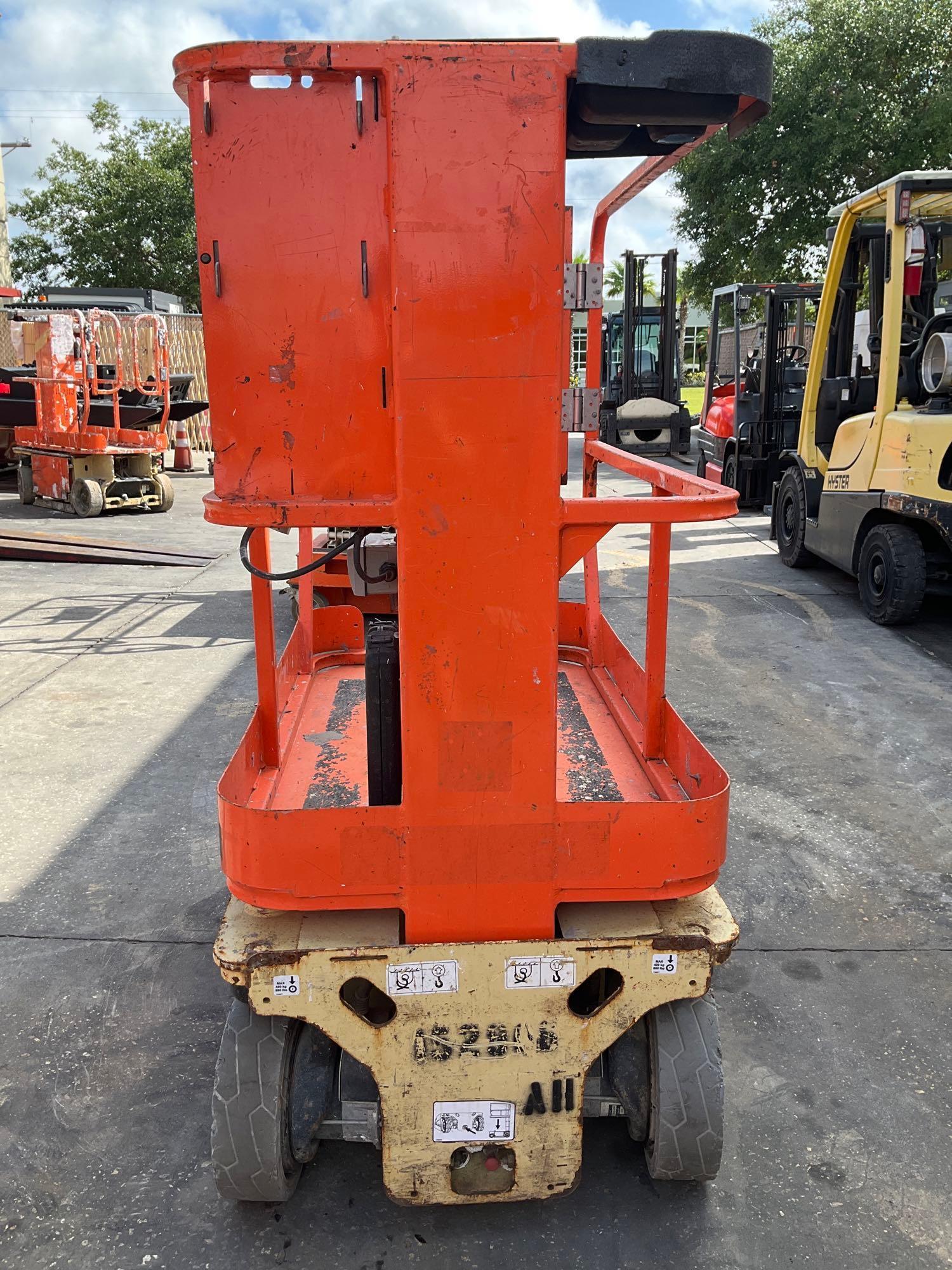 2015 JLG MANLIFT MODEL 1230ES, ELECTRIC, APPROX MAX PLATFORM HEIGHT 12FT, NON MARKING TIRES, BUIL...