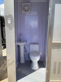 UNUSED STAINLESS STEEL PORTABLE TOILET UNIT, ELECTRIC & PLUMBING HOOK UP WITH EXTERIOR PLUMBING C...