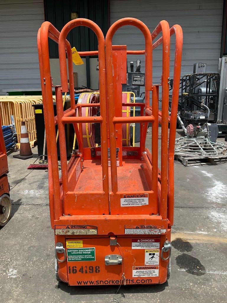 **2015 SNORKEL MAN LIFT MODEL TM12 , ELECTRIC, APPROX MAX PLATFORM HEIGHT 12FT, NON MARKING TIRES,