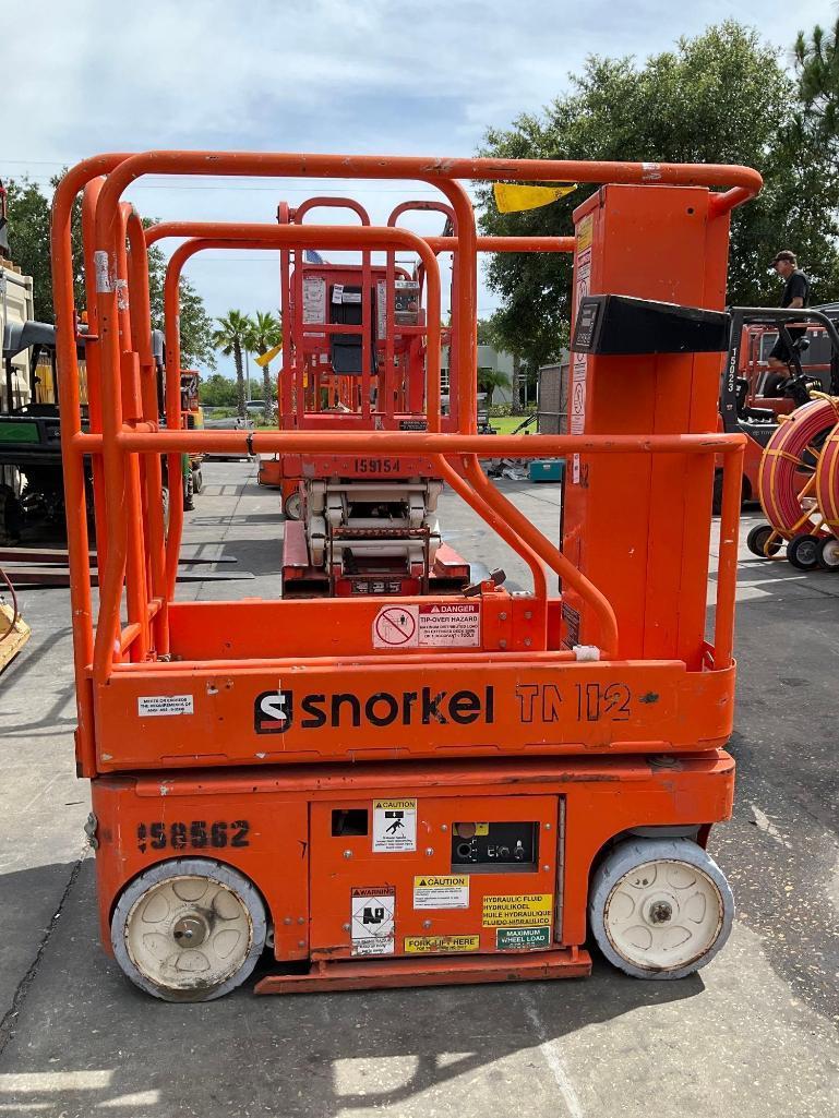 SNORKEL MAN LIFT MODEL TM12 , ELECTRIC, APPROX MAX PLATFORM HEIGHT 12FT