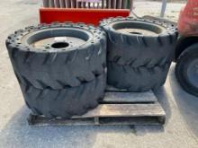 4 SKID STEER TIRES, 8LUG HOLES