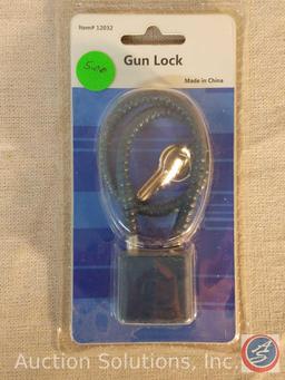 (3) Gun locks, Item #12032 made in China. In original packaging with keys