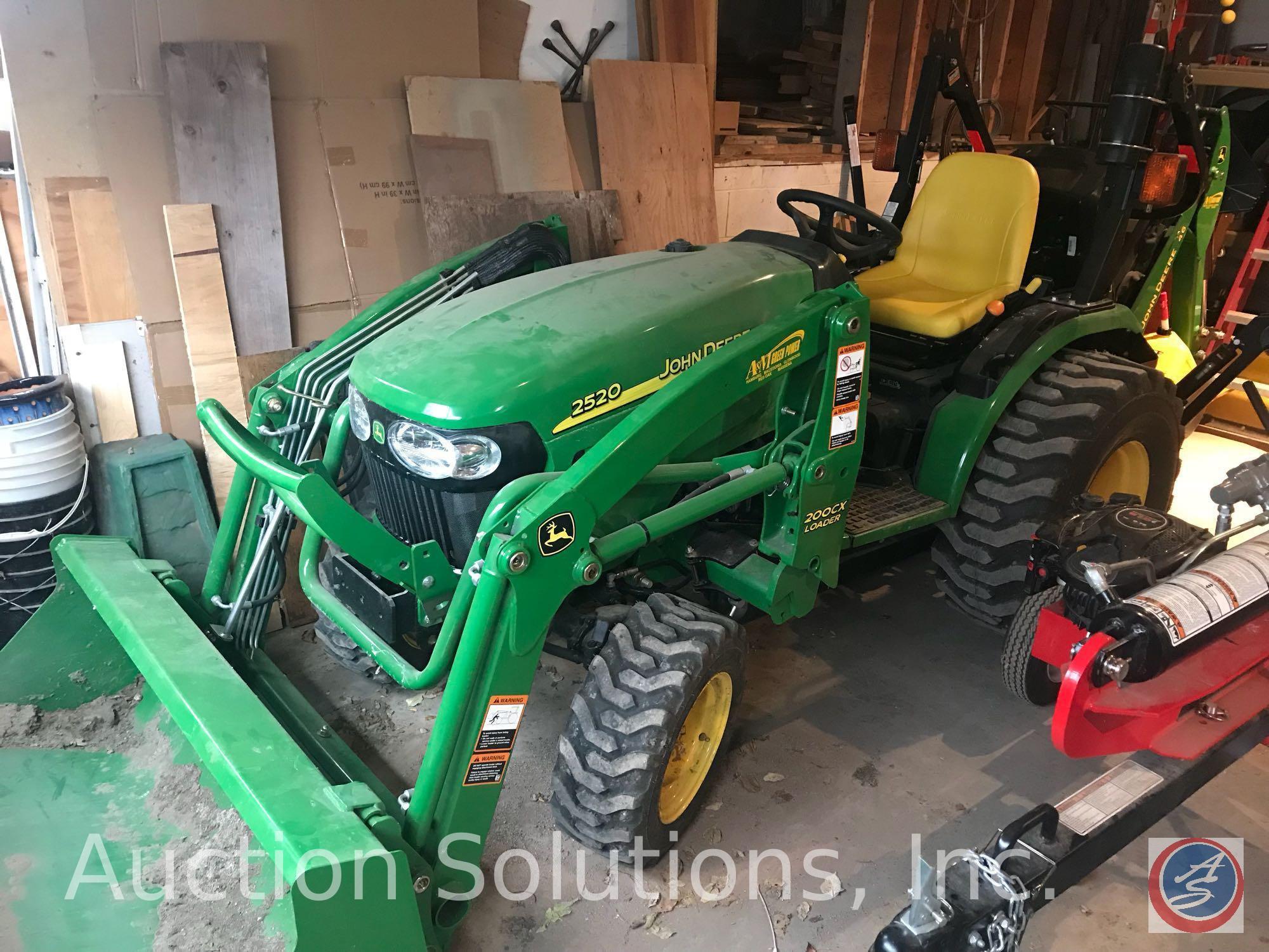 John Deere 2520 MFWD Acreage Tractor. This tractor has a 200 CX loader, and incredibly low [10!] hrs