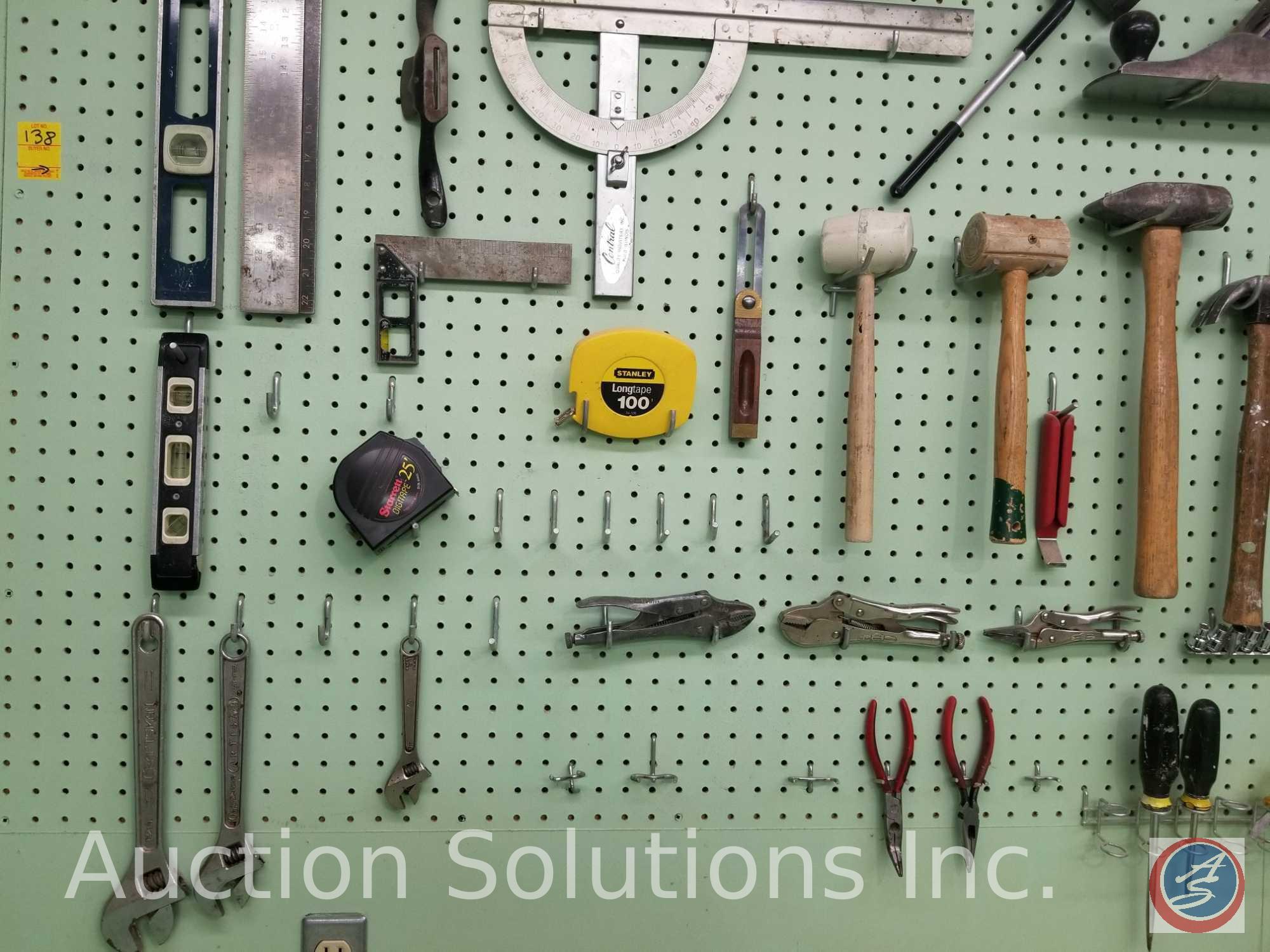 contents of pegboard to include assorted hammers, saws, levels and other hand tools (pegboard not