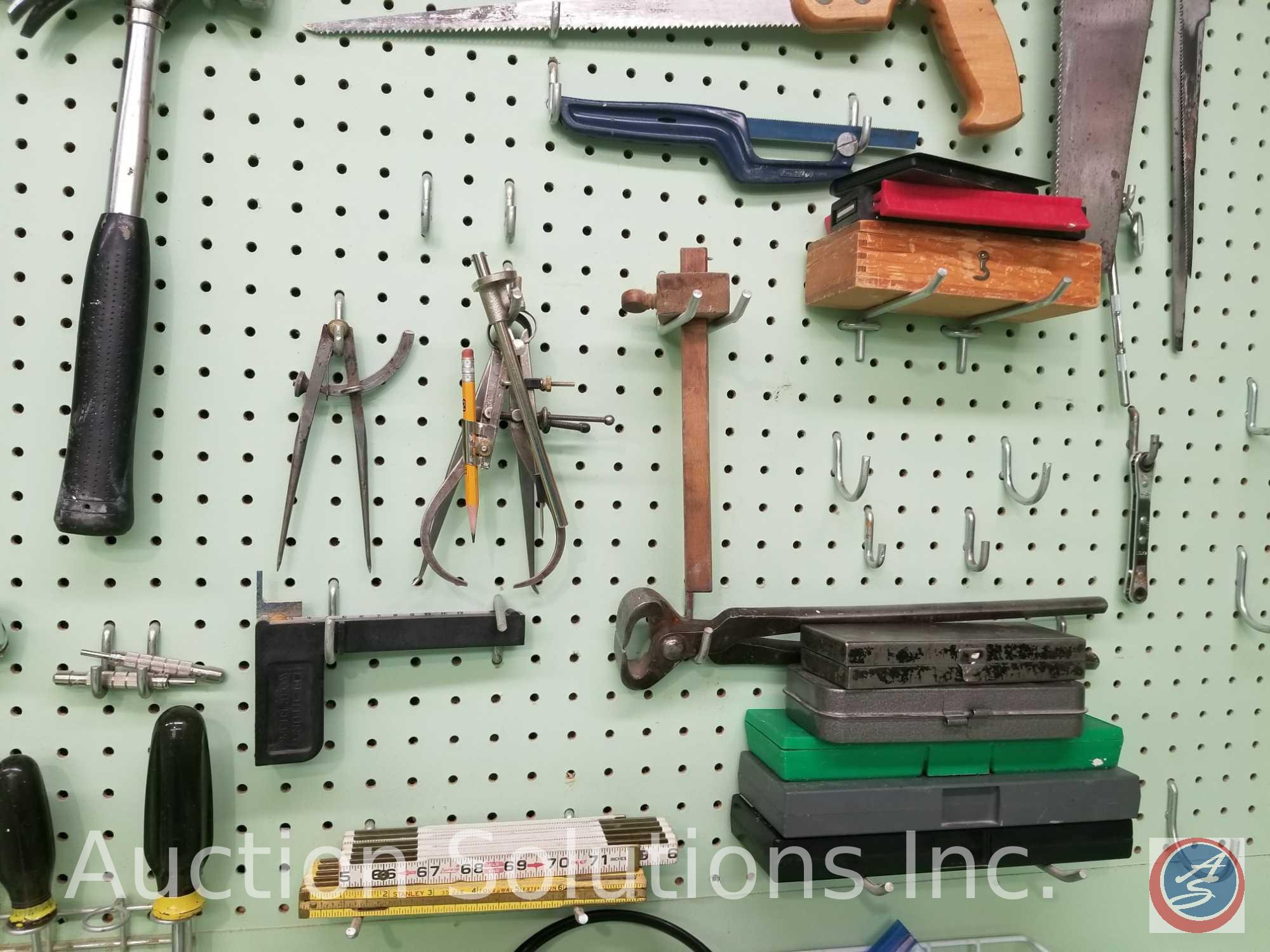 contents of pegboard to include assorted hammers, saws, levels and other hand tools (pegboard not