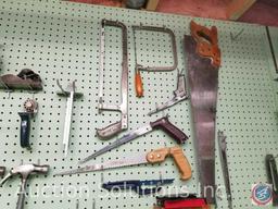 contents of pegboard to include assorted hammers, saws, levels and other hand tools (pegboard not