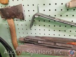 contents of pegboard to include ax, sledgehammer, files, grinding wheels, pry bars and more