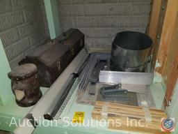 contents under cabinet to include metal L brackets, blinds, metal toolbox (empty) and other misc.