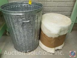 Metal trash can and roll of new insulation