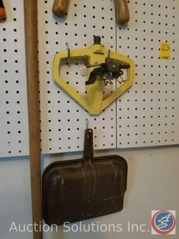 contents of pegboard to include loppers, hand shovels, sprinkler, rake and more (pegboard not