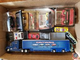 Matchbox collectible police cars, and Camaro tractor trailer