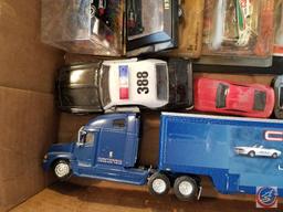 Matchbox collectible police cars, and Camaro tractor trailer