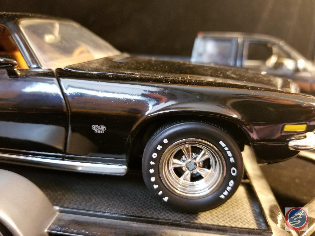 (3) piece set including black Chevy 1500 Z71 and 1971 Camaro on trailer