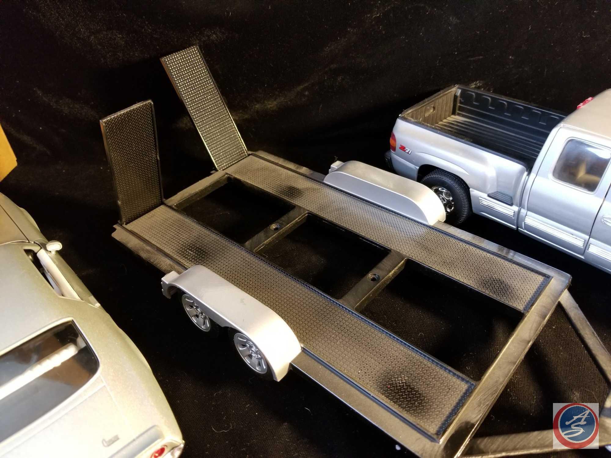 (2) piece set including 1500 Chevy extended cab with trailer and 1971 Camaro