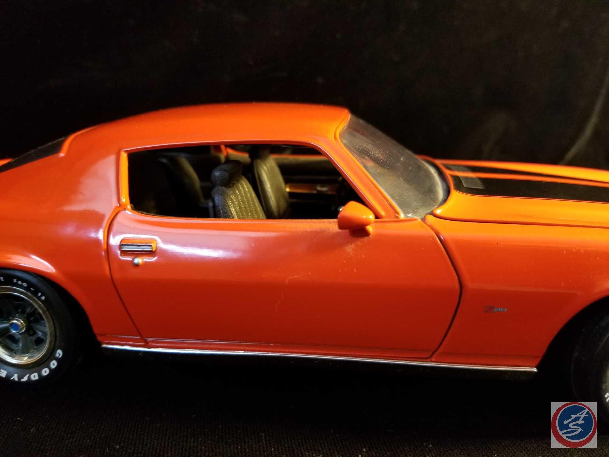 Ertl die cast Chevy Camaro, orange in color