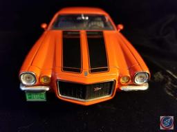 Ertl die cast Chevy Camaro, orange in color