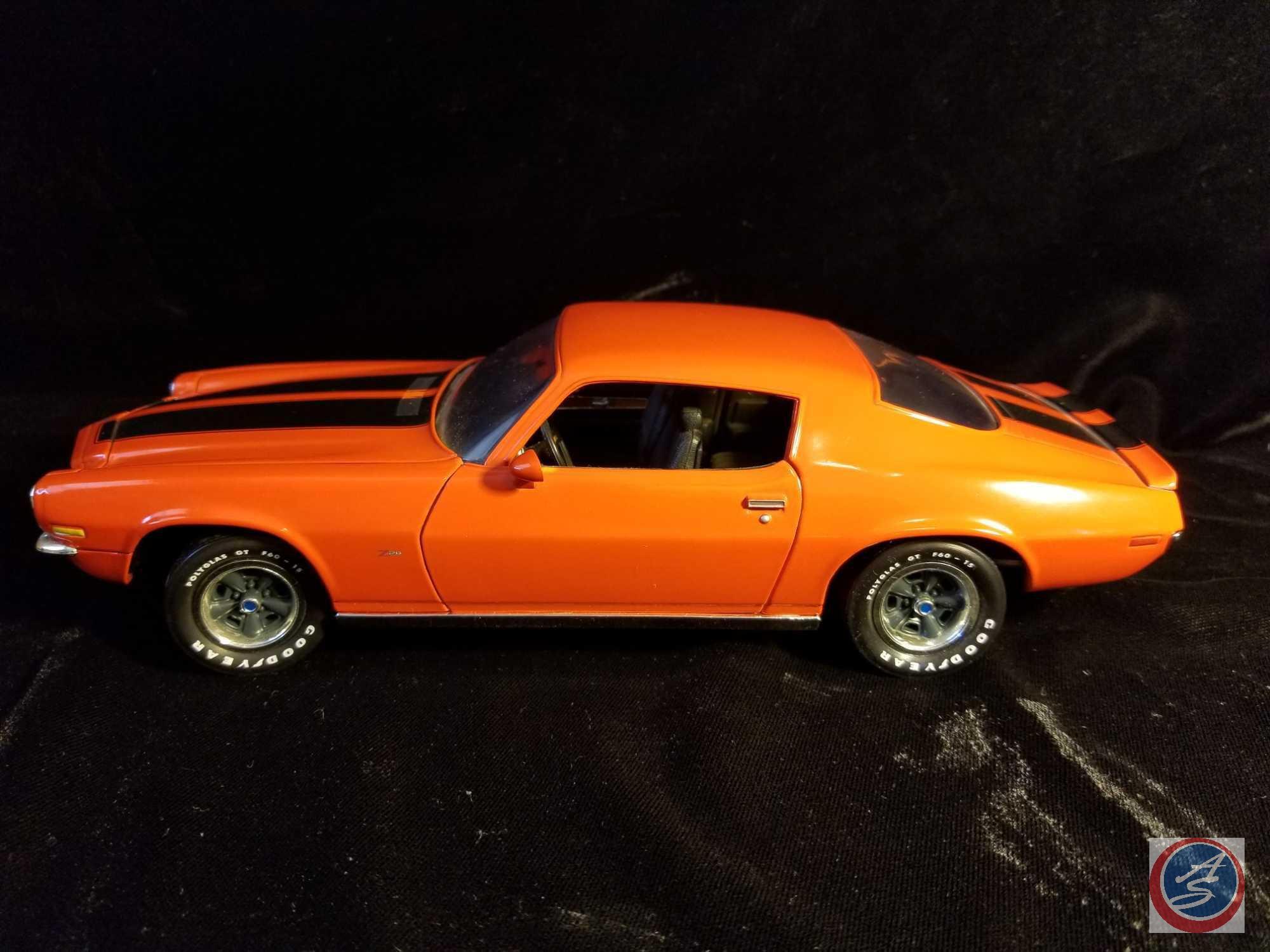 Ertl die cast Chevy Camaro, orange in color