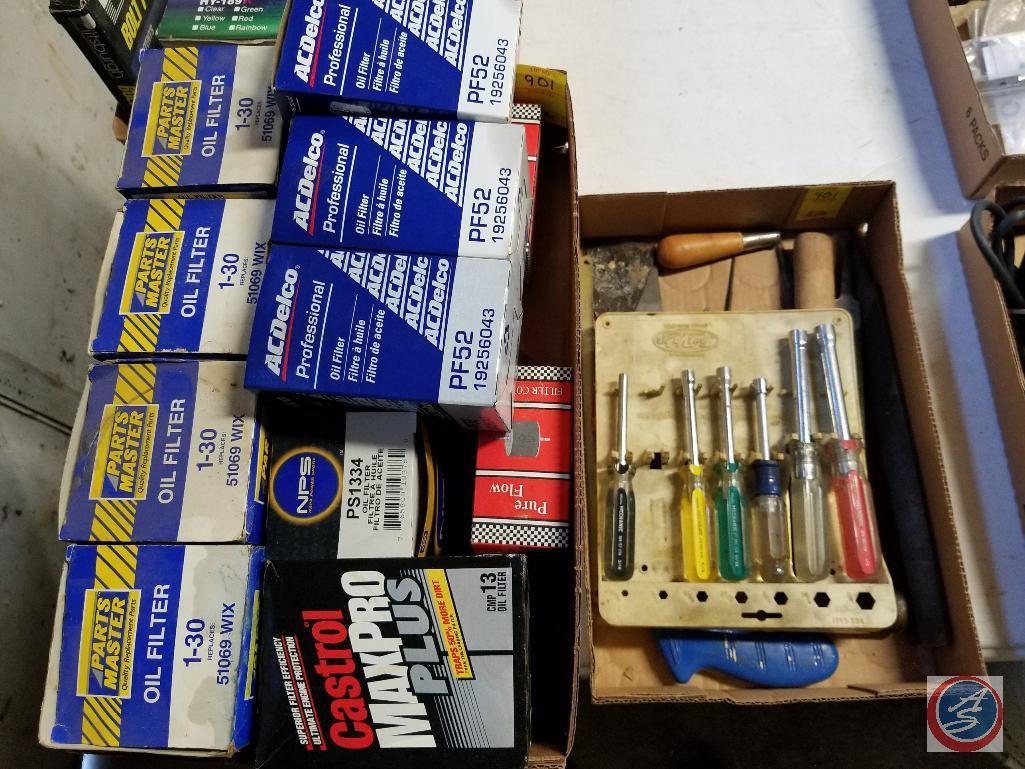 Assorted sizes of hex head Master Mechanic screwdrivers, putty knives, level, files, AC Delco oil