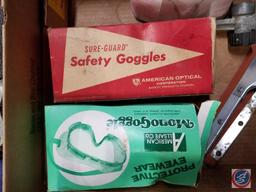 (2) safety goggles, (2) squeegees, Anti-freeze and summer coolant tester, Nu-Pride finishing trowel