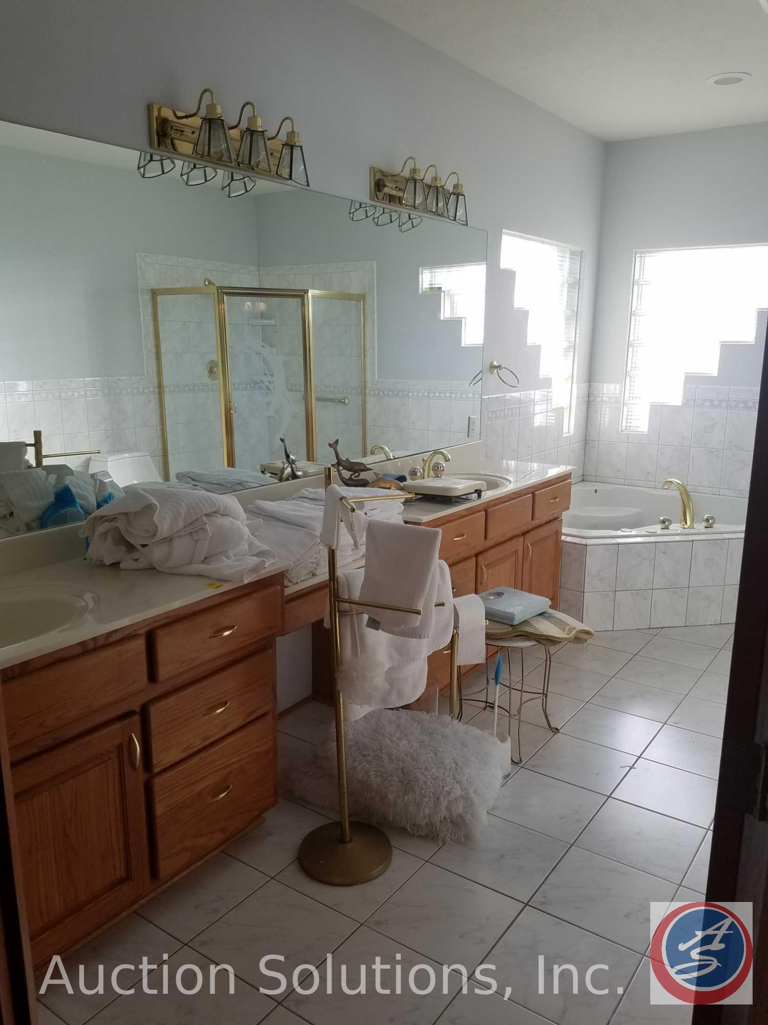 Salvage rights to the Master Bathroom including; Cabinets, Counters, Sink, Mirror, Shower, Corner