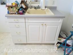 Salvage rights to Laundry Room including: Cabinets measuring: 5ft, 2ft and 12 in. sections Corner