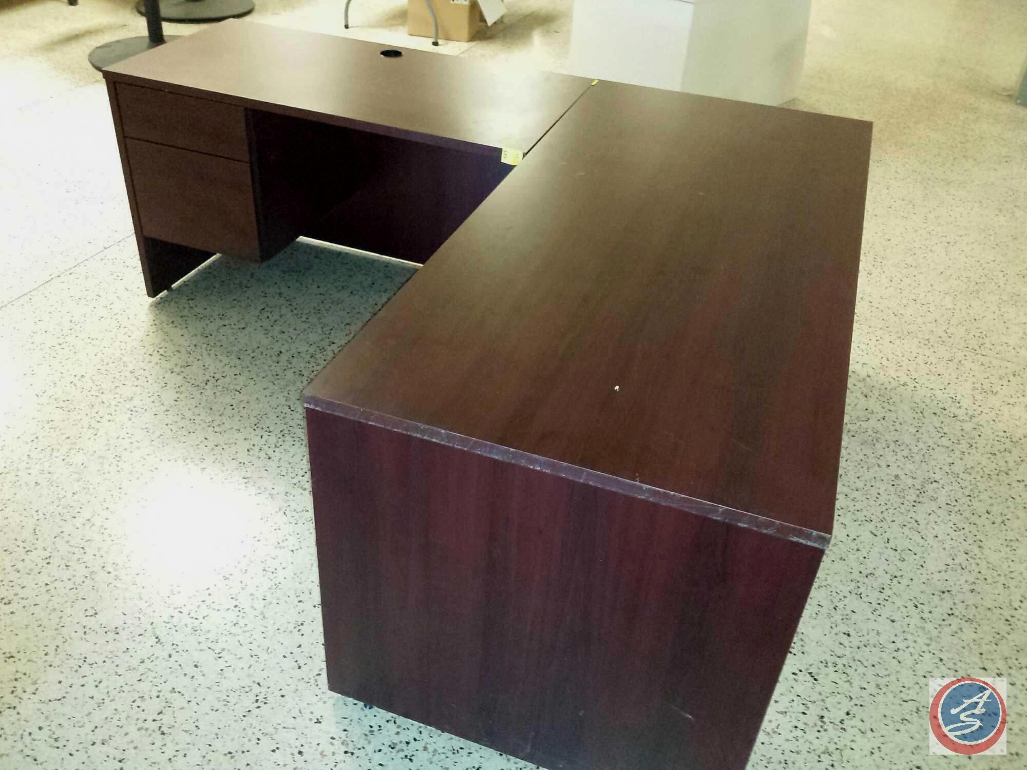 Cherry wood L-shaped desk w/ [4] drawers total, measuring 4ftx2ftx2.5ft and 5.5ftx2.5ftx2.5ft