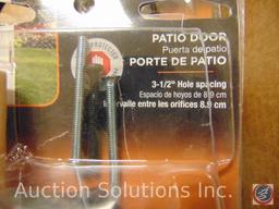 Flat containing Patio door hardware for handles and locks