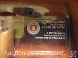Flat containing Patio door hardware for handles and locks
