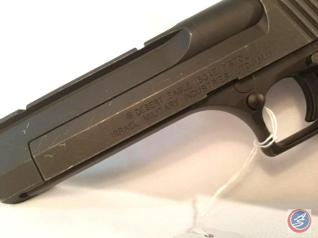 Manufacturer: ISI Magnum Research Model: Desert Eagle Caliber: 50 AE Serial #: 9520853 Type: S/A