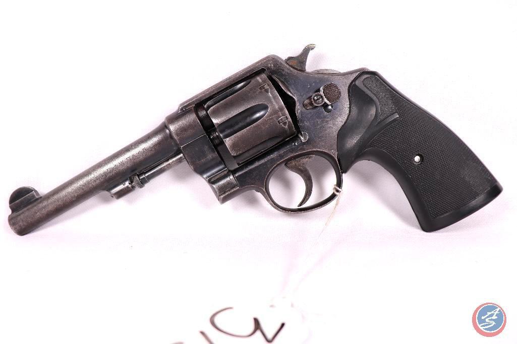 Manufacturer: S W Model: M1917 Caliber: 45 acp Serial #: 51807 Type: D/A Revolver with Clean