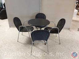 Round metal patio table (28" around x 29" tall) and (4) metal and wicker patio chairs