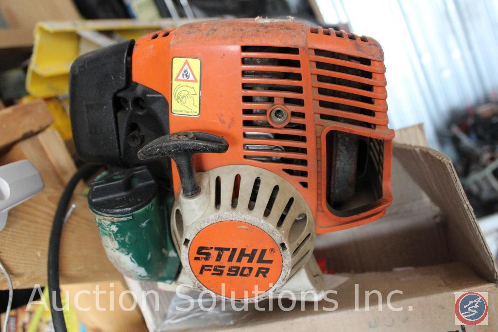 10x20 unit containing girls bicycle, snow board, air tanks, assorted tools, Stihl FS90R weed eater,