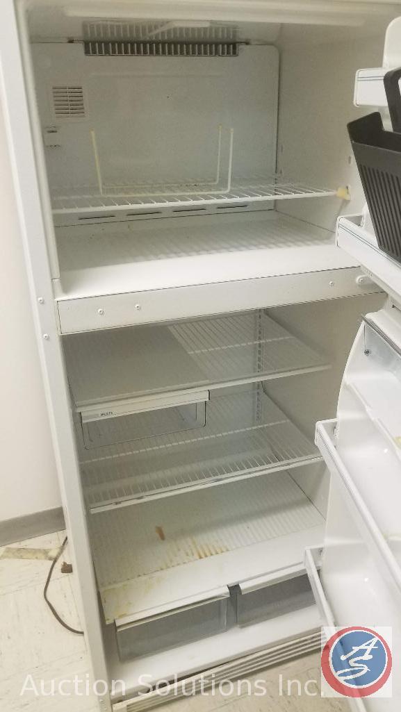 Emerson microwave, two 4 x 6 wooden shelving units and an RCA refrigerator freezer