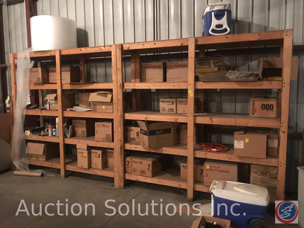 Assorted mailing supplies and wooden shelf