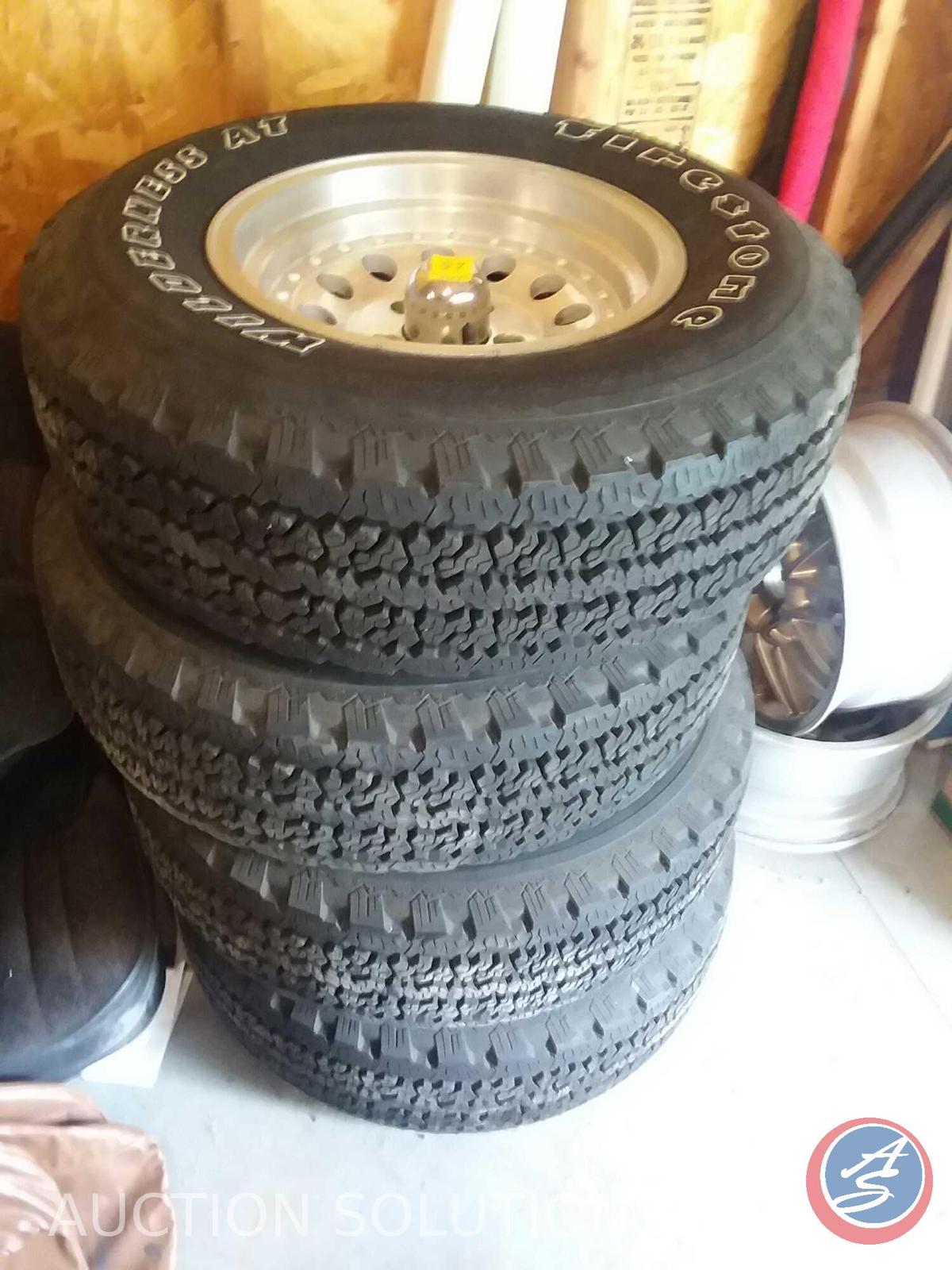 (4) Firestone Wilderness AT tires (P235/75R15-105S)