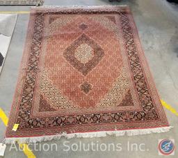 5' x 7' (approx.) Hand knotted Oriental Tabriz rug. Wool fibers tightly knotted onto cotton warp