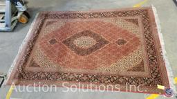 5' x 7' (approx.) Hand knotted Oriental Tabriz rug. Wool fibers tightly knotted onto cotton warp