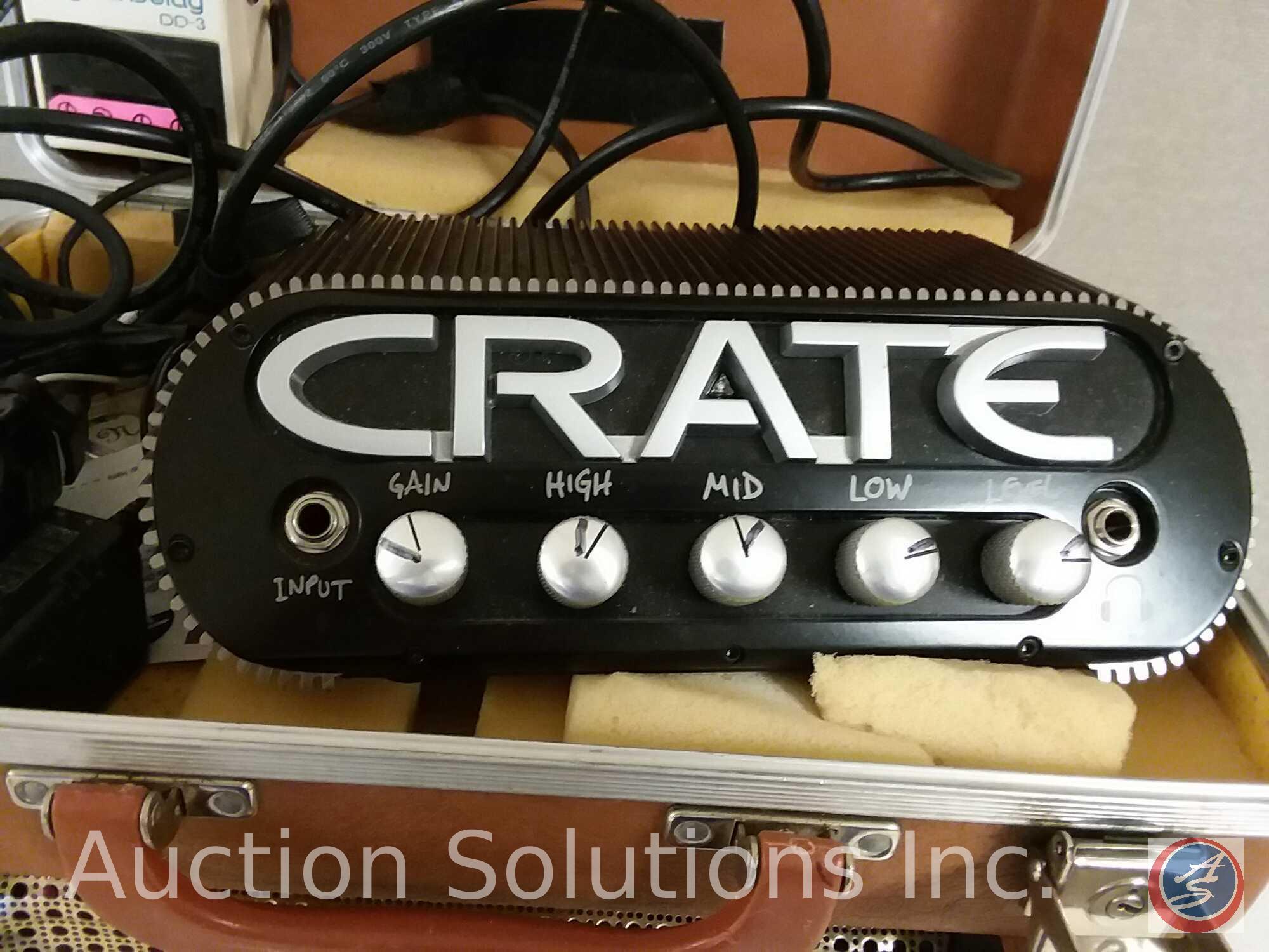 Crate Power Block Amp (with case), with a Boss DD-3 delay pedal, attached to a Bose speaker (the