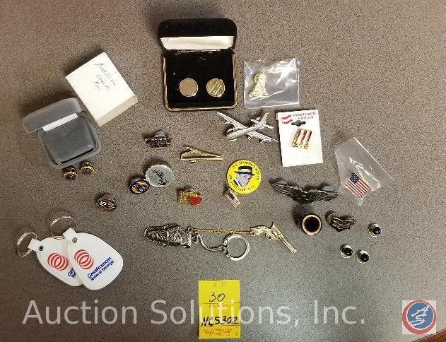 group of cufflinks, keychains, misc. buttons