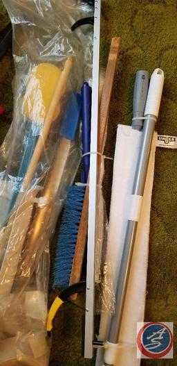 Assorted cleaning tools including; carpet sweeper, broom/dust pan, reachers, lint brushes and more