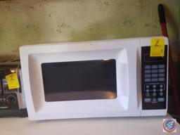 Mainstays microwave oven (model #EM720CGA-W), Hamilton Beach toaster (model #22790), Black and