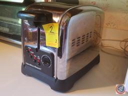 Mainstays microwave oven (model #EM720CGA-W), Hamilton Beach toaster (model #22790), Black and